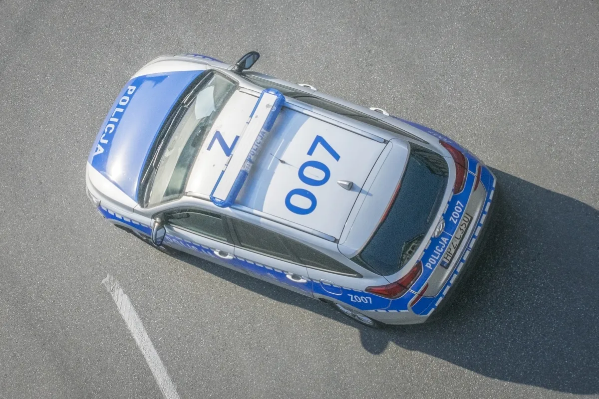 Police car seen from above with 007 painted on its roof